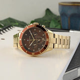 TOMMY HILFIGER MELLIE BROWN DIAL GOLD PLATED STEEL WATCH 1782709